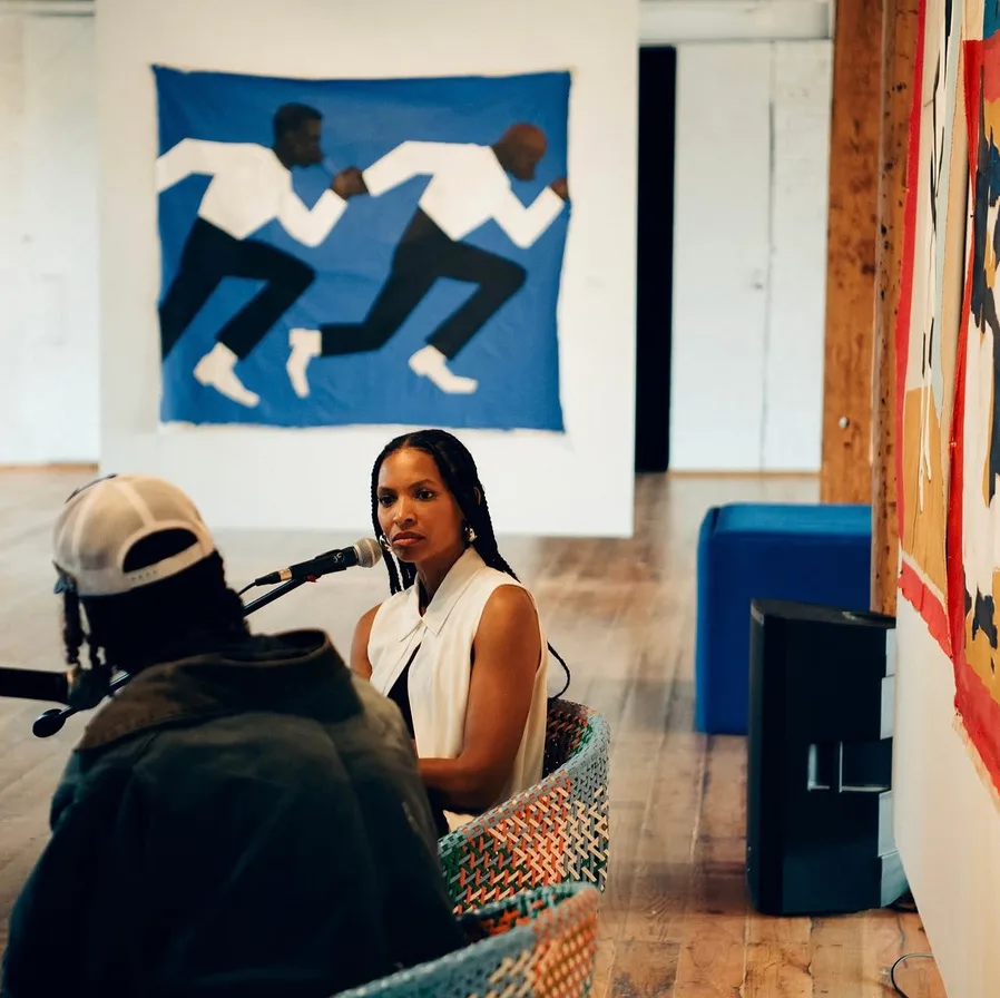 Alex Delotch Davis leading a seated conversation
